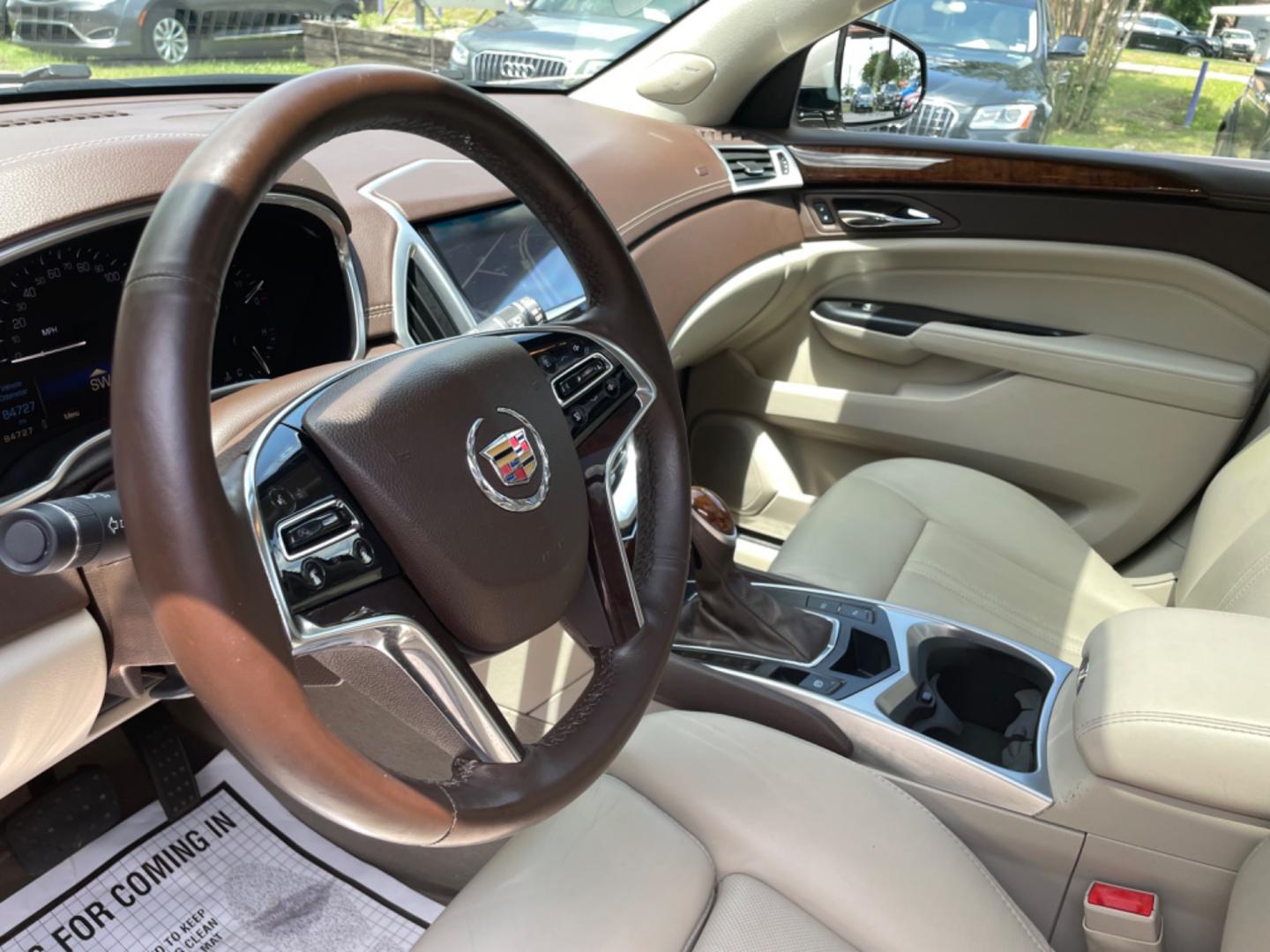 2016 SILVER CADILLAC SRX LUXURY COLLECTION (3GYFNEE33GS) with an 3.6L engine, Automatic transmission, located at 5103 Dorchester Rd., Charleston, SC, 29418-5607, (843) 767-1122, 36.245171, -115.228050 - Photo#20